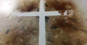 cross made of finger prints