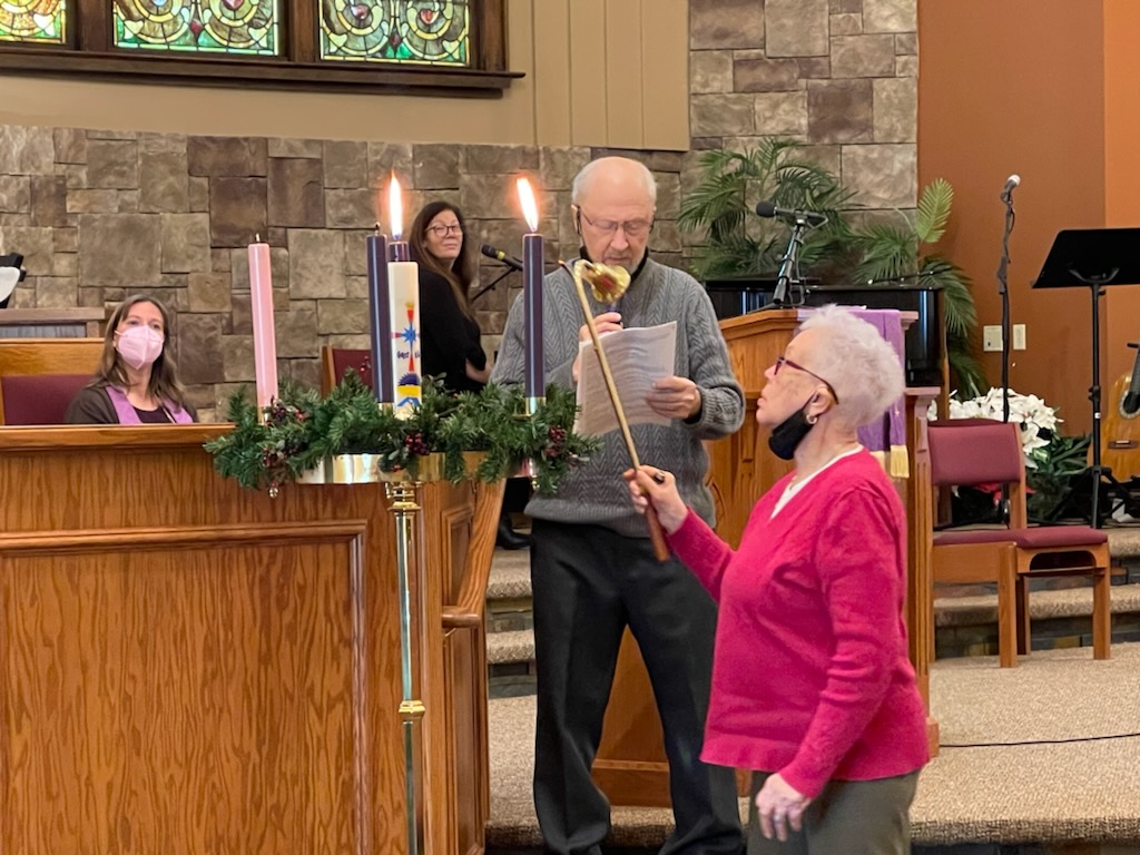 Members lighting Advent Candles