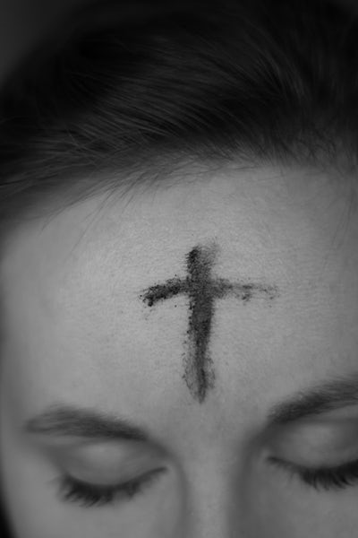 Ashes on a woman's forehead, Ahna Ziegler, Unsplash