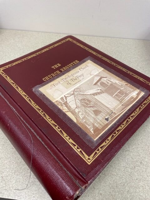 Large Red Book that is Church Register