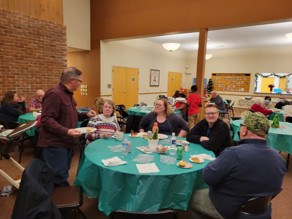 People Eating at Christmas Party