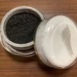 ashes in a small cosmetic jar