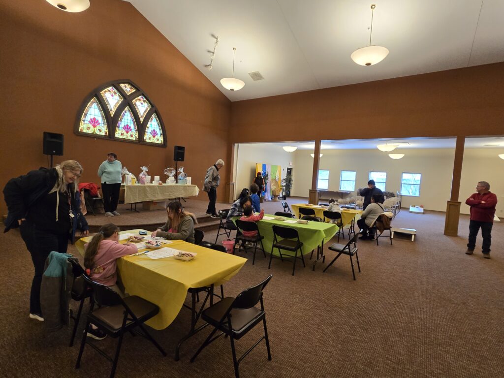 Egg Hunt setup with craft tables and baskets