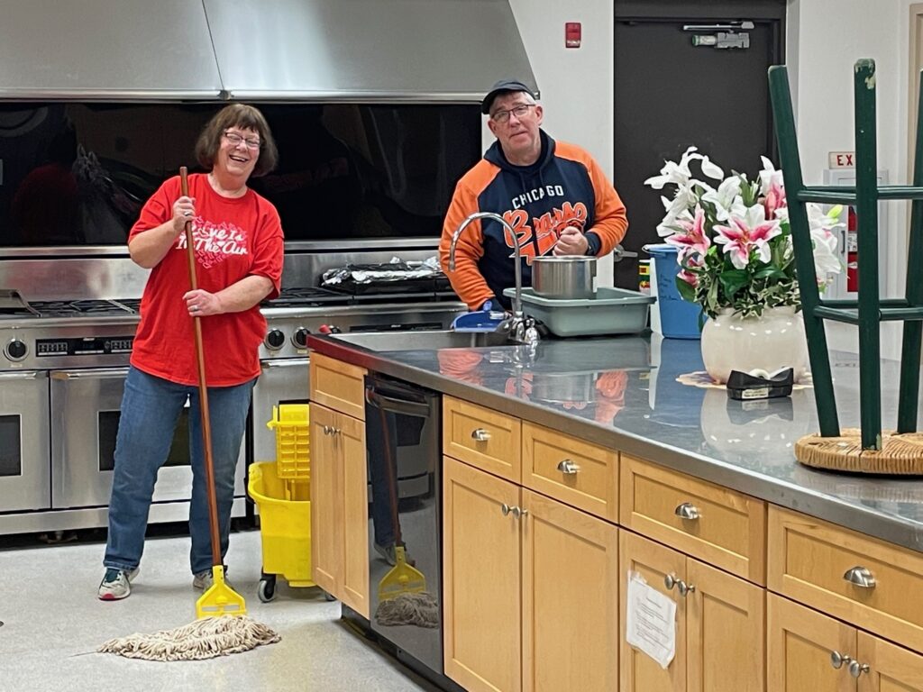 Ruth and Steve mopping