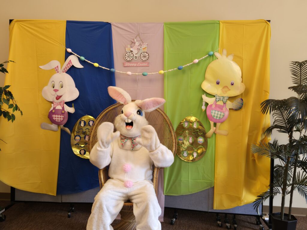person waving in an easter bunny custom