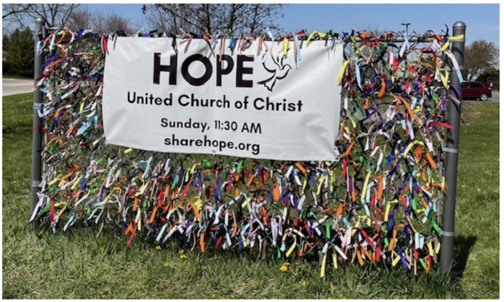 Hope sign with ribbons to welcome the LGBTQIA+ community