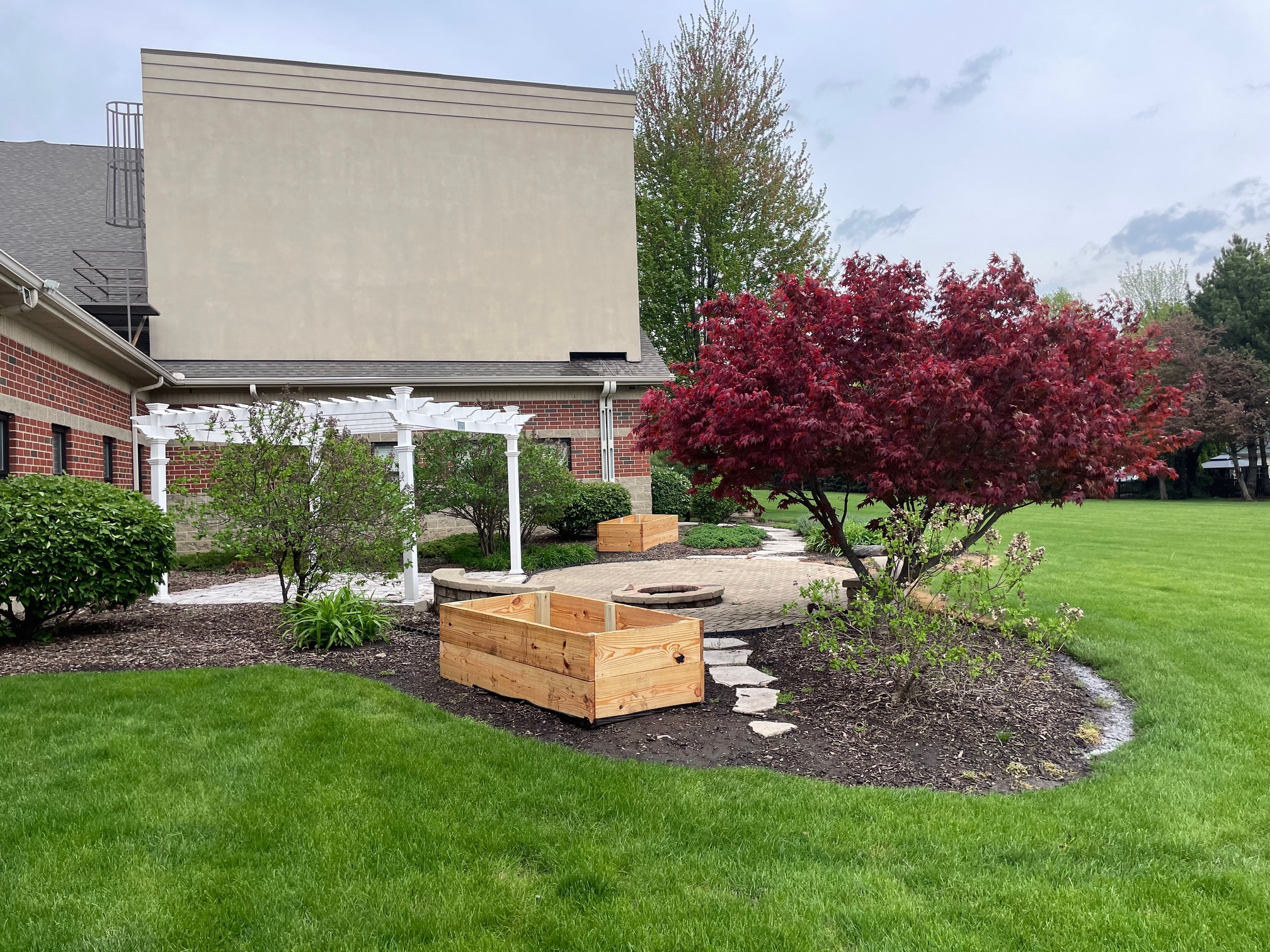 Two raised garden beds in the backyard of FPCD