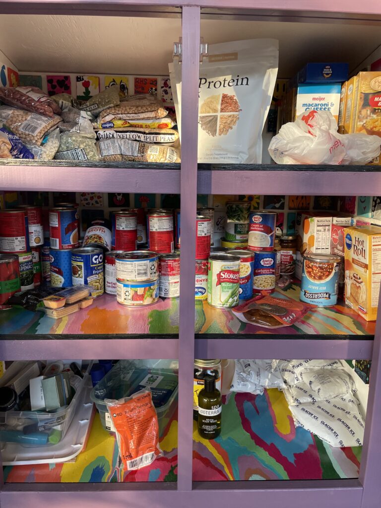 Micropantry items including cans, dried goods, and personal hygiene items