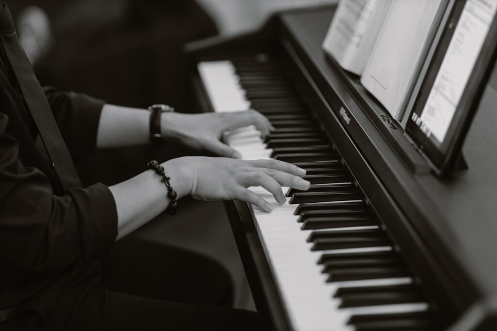 person playing a piano