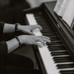 person playing a piano