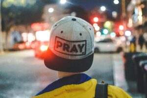 pray hat image from joshua hanks, unsplash